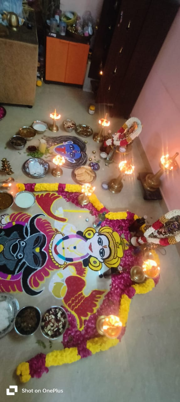 Floor ritual with lamps and offerings